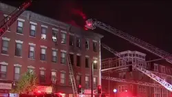 Woman rescued from heavy fire on Tremont Street in Boston, 14 displaced