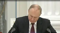 Russia awaits Ukraine’s confirmation on a planned exchange of dead fighters, officials say
